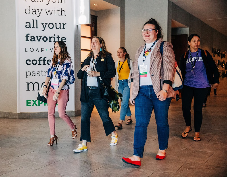 SBI Association Management homepage image SBI Association Management event management action photo of team walking at conference event